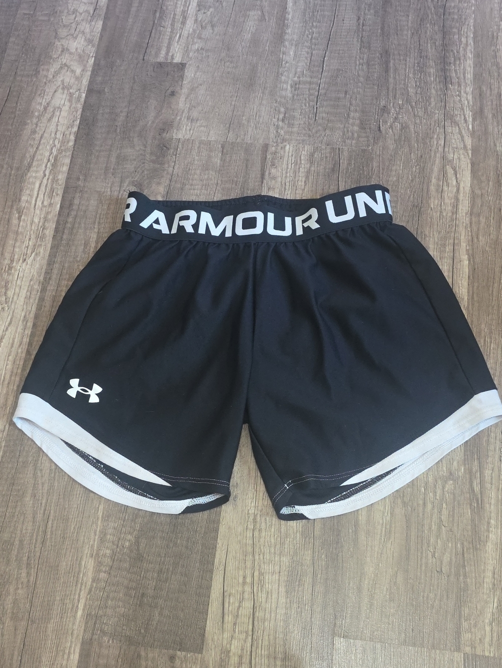 Under Armour Black Athletic Shorts with White Accents Size Small.